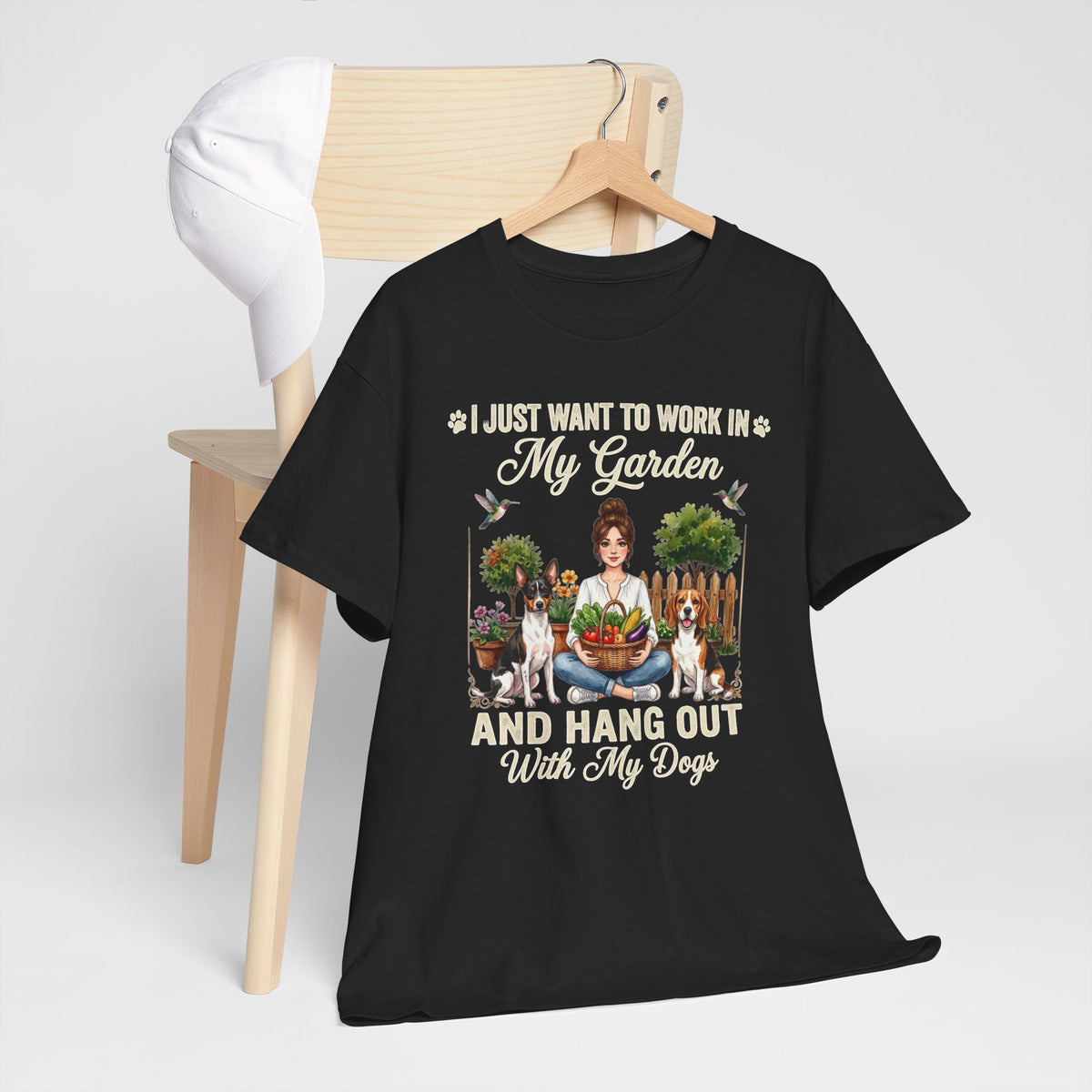 I Just Want to Work in My Garden and Hang Out With My Dogs Unisex T-Shirt — woman sits happily in her garden