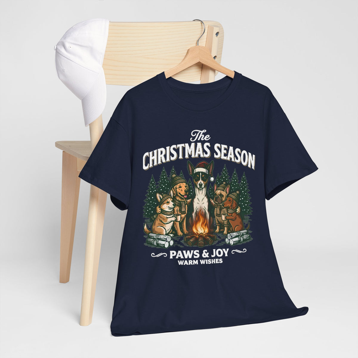 The Christmas Season Unisex T-Shirt — dogs gather around a warm campfire