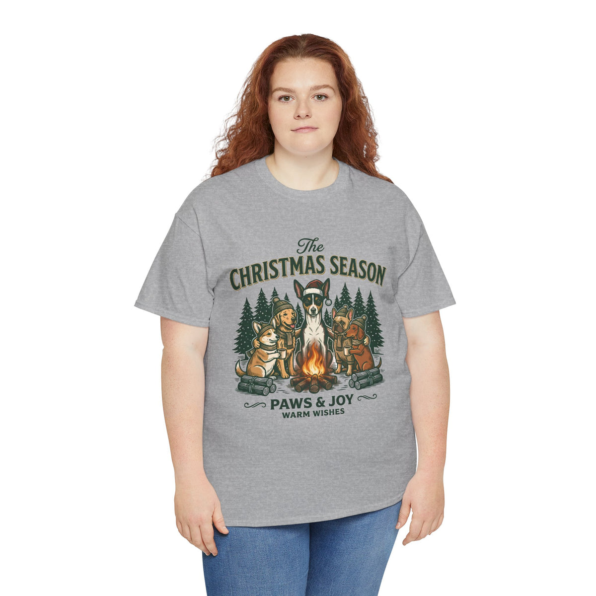 The Christmas Season Unisex T-Shirt — dogs settle in around a crackling campfire
