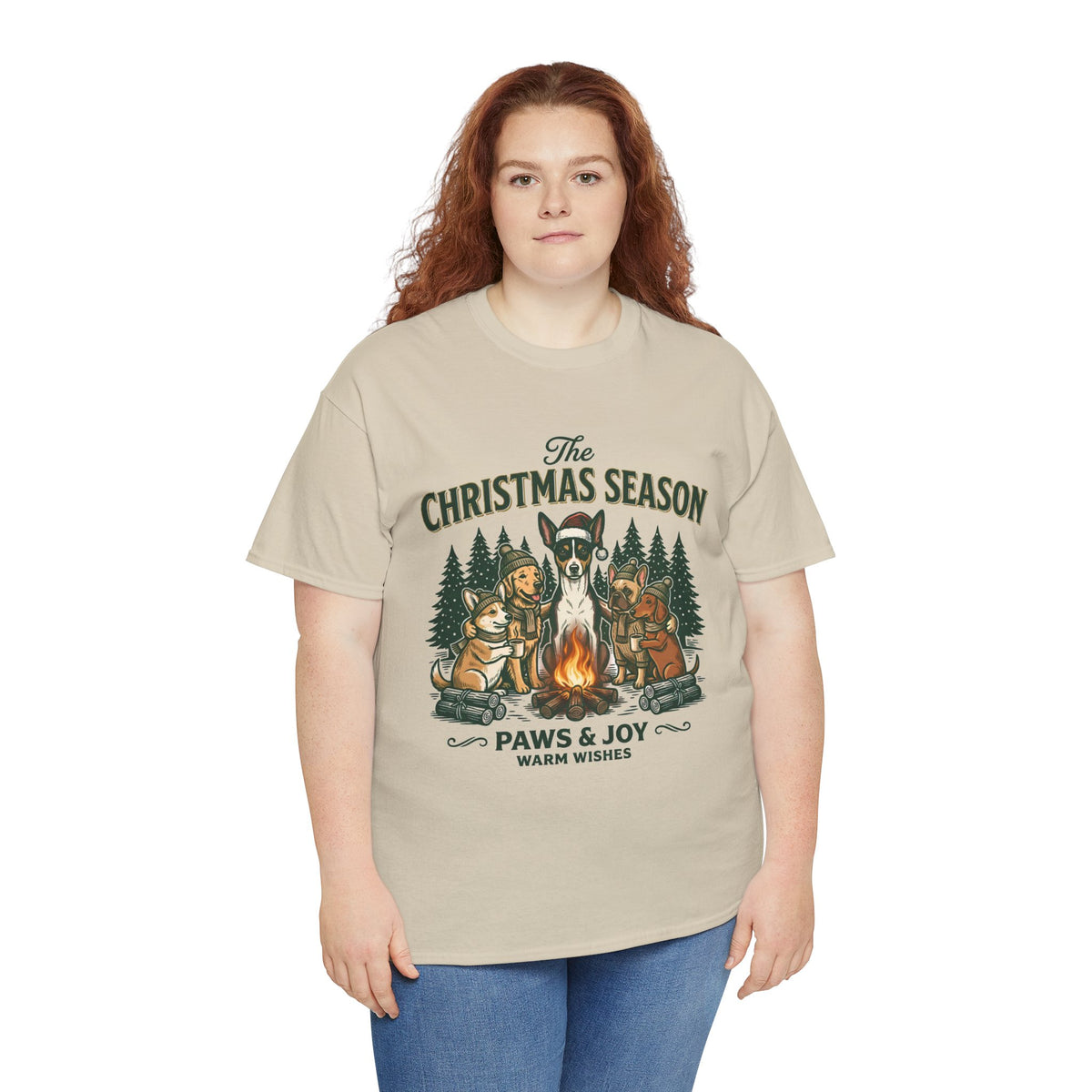 The Christmas Season Unisex T-Shirt — dogs settle in around a crackling campfire