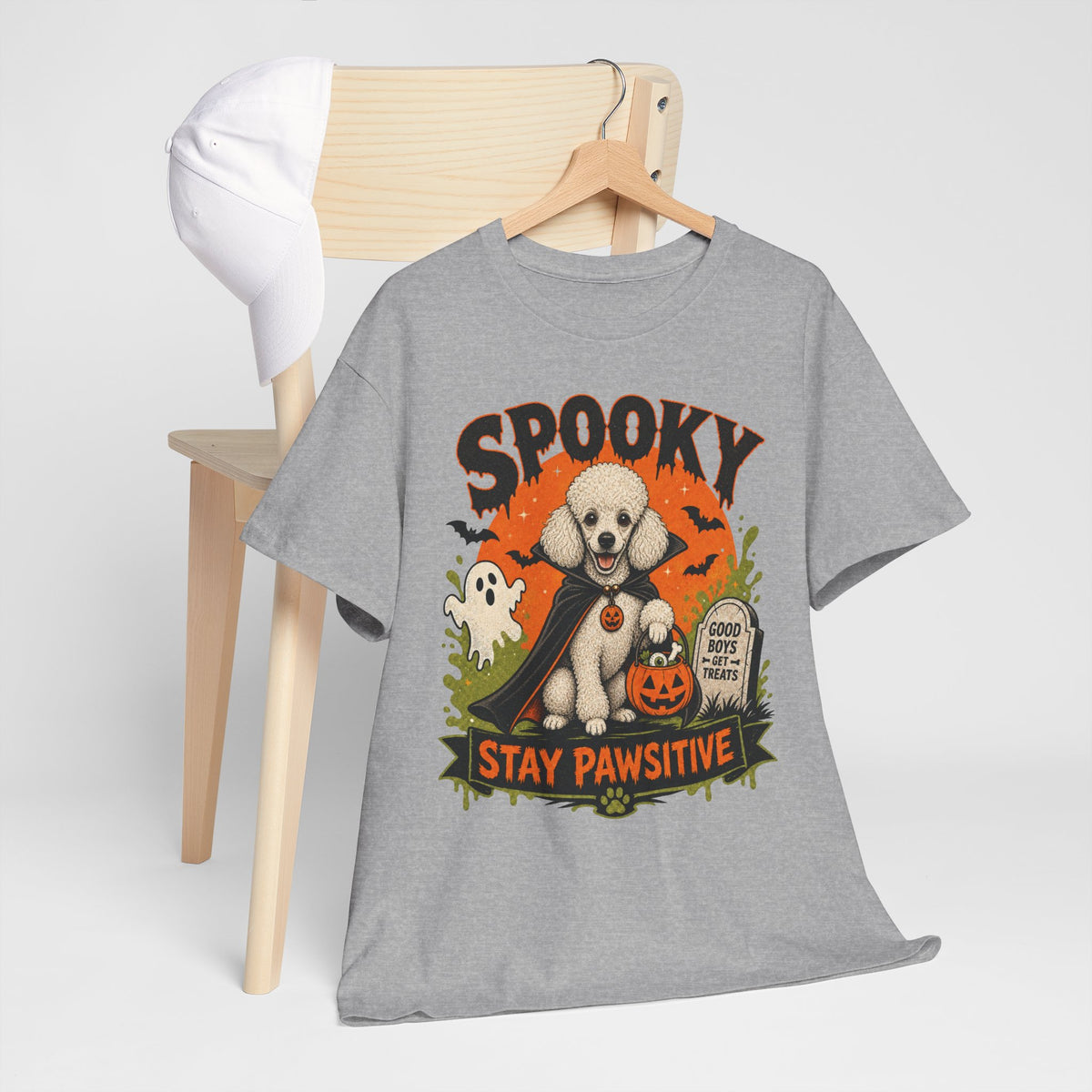 Spooky Stay Pawsitive Unisex T-Shirt — a vampire-caped white Poodle