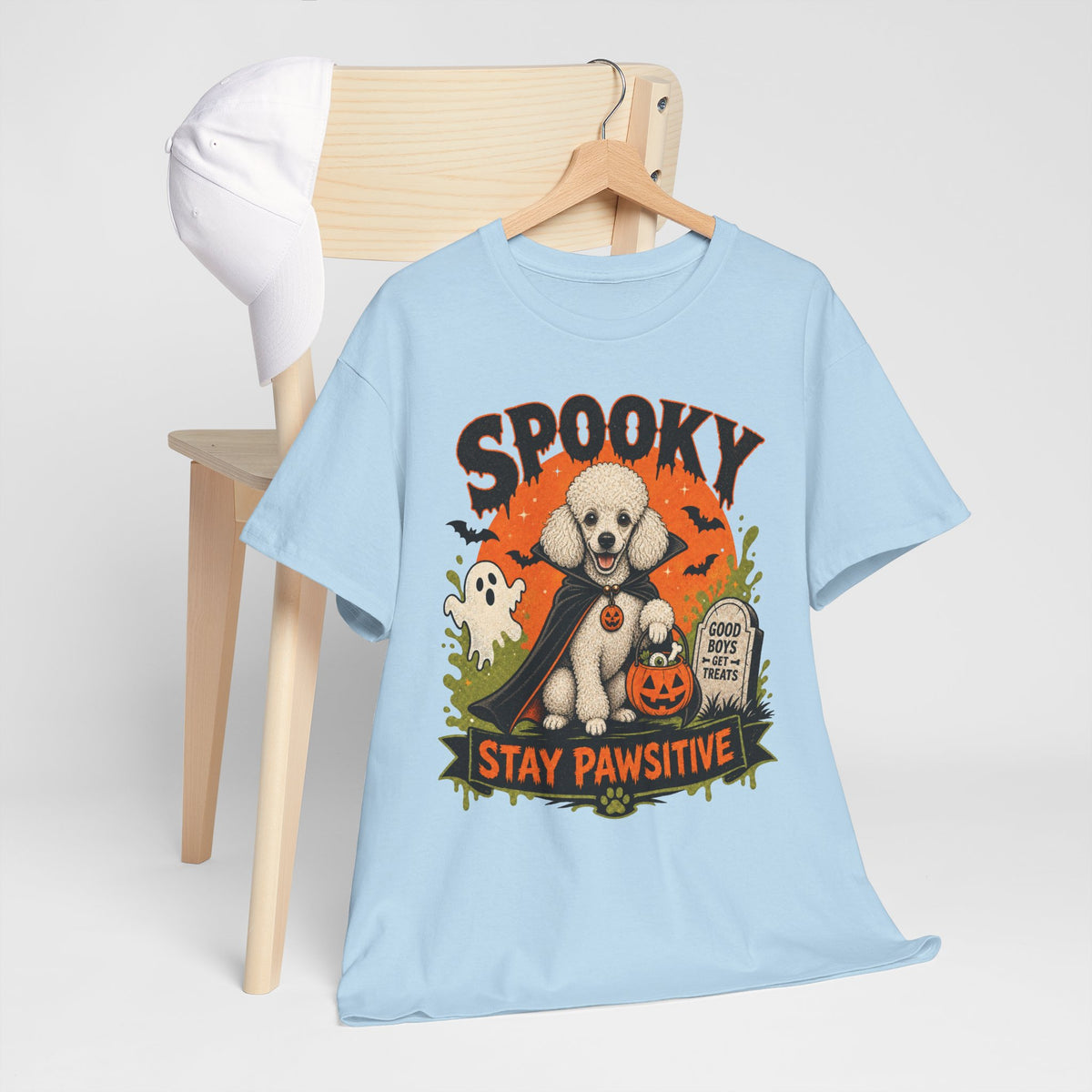Spooky Stay Pawsitive Unisex T-Shirt — a vampire-caped white Poodle