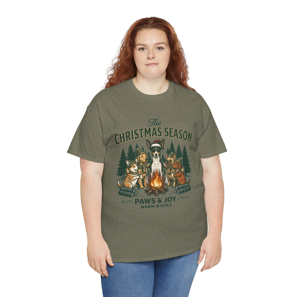 The Christmas Season Unisex T-Shirt — dogs settle in around a crackling campfire