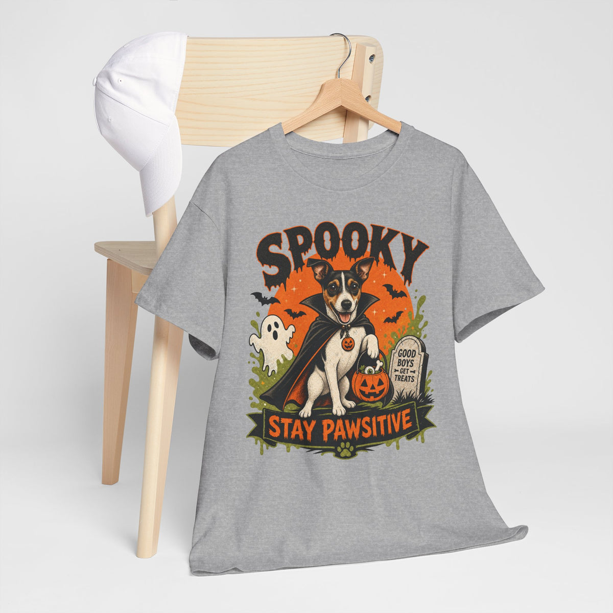 Spooky Stay Pawsitive Unisex T-Shirt — a vampire-caped Jack Russell Terrier