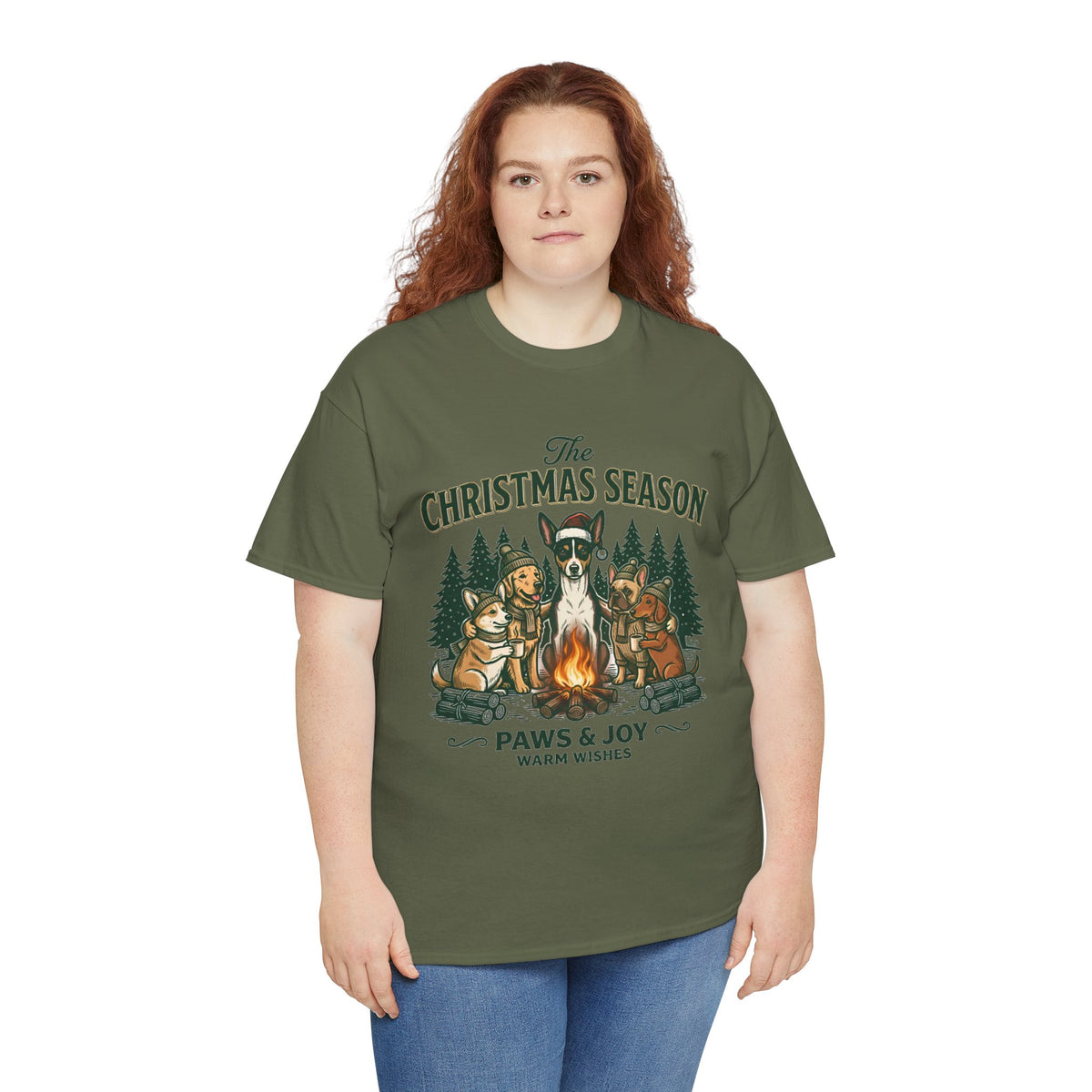 The Christmas Season Unisex T-Shirt — dogs settle in around a crackling campfire