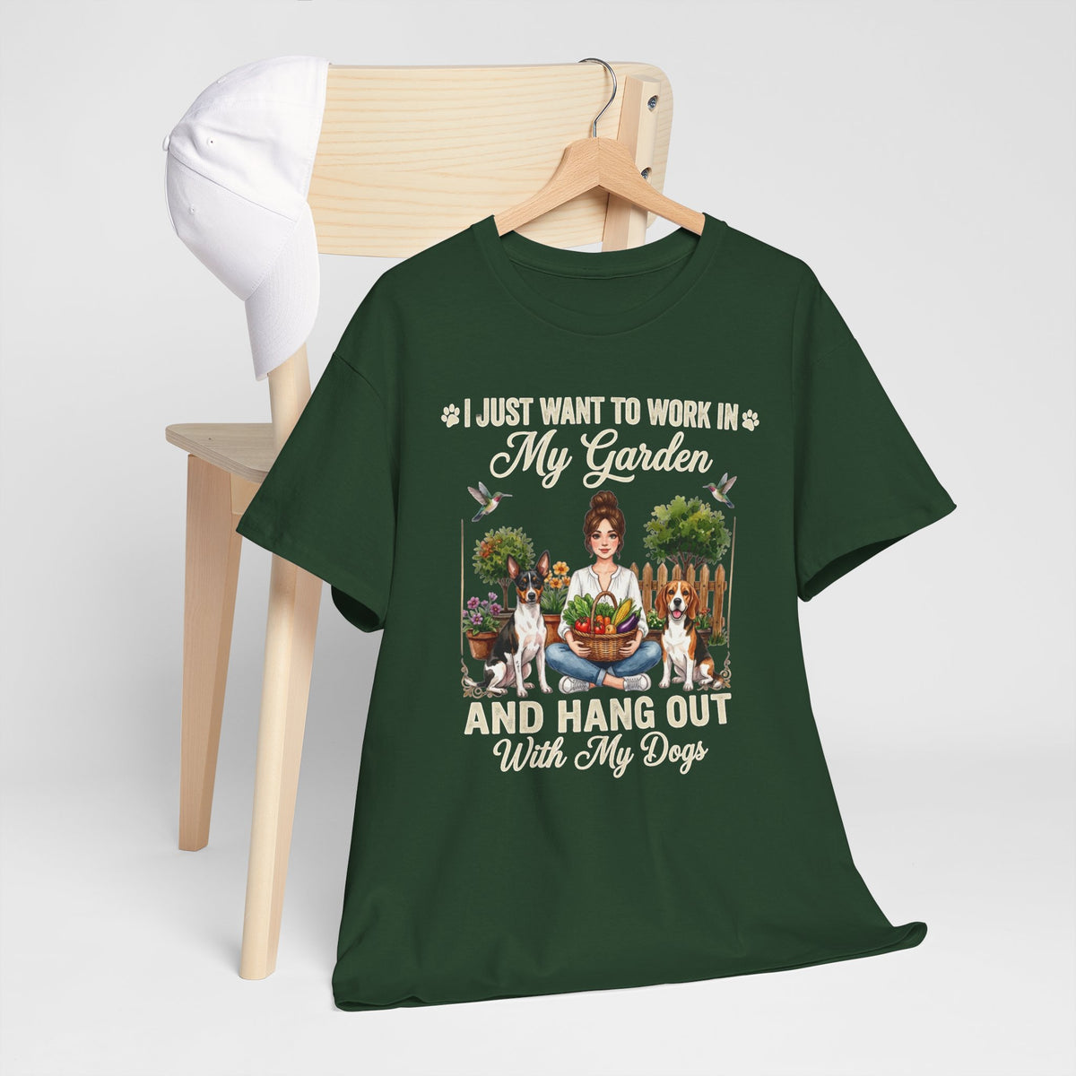 I Just Want to Work in My Garden and Hang Out With My Dogs Unisex T-Shirt — woman sits happily in her garden