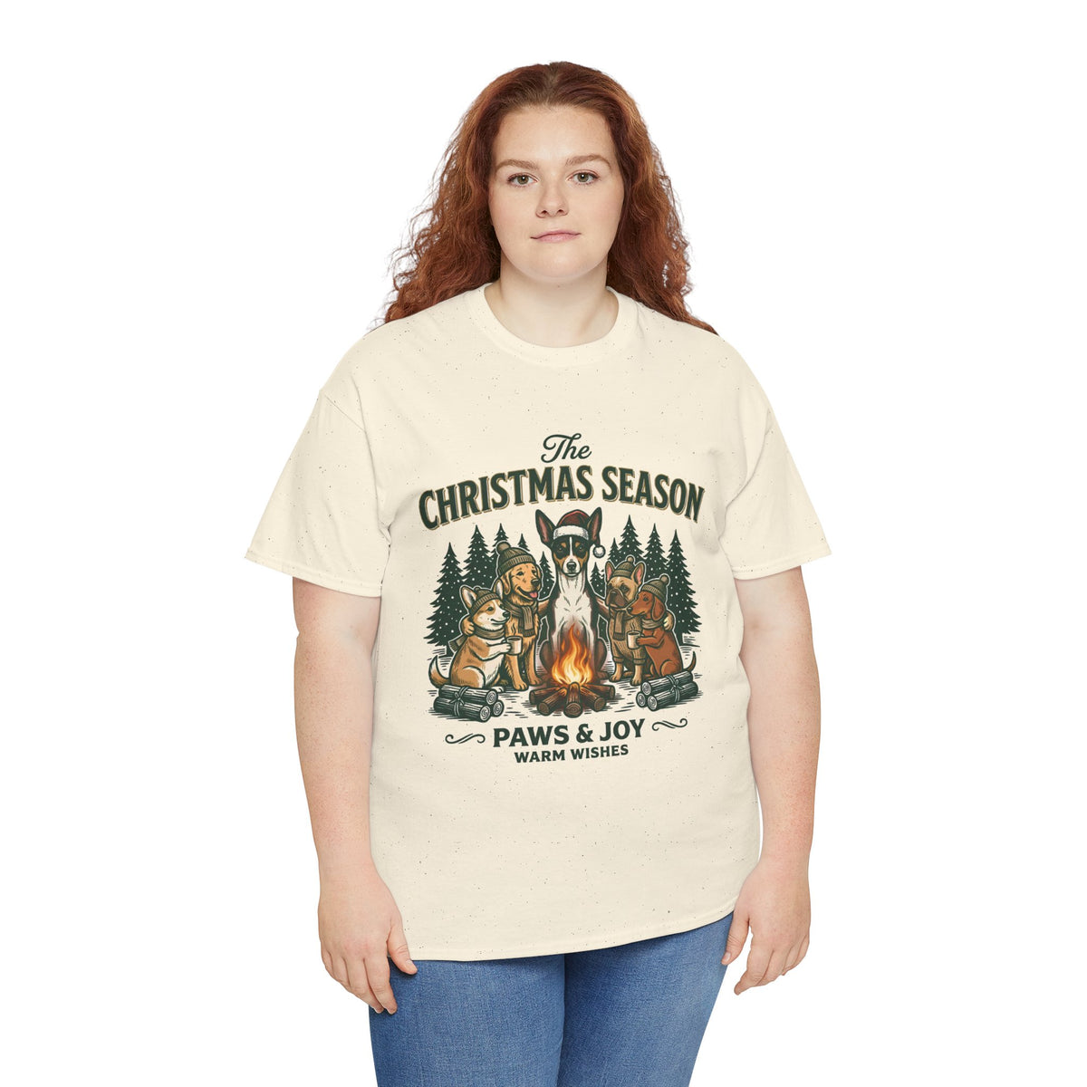The Christmas Season Unisex T-Shirt — dogs settle in around a crackling campfire