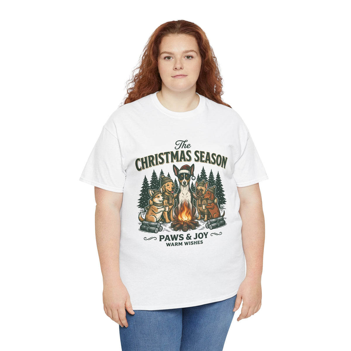 The Christmas Season Unisex T-Shirt — dogs settle in around a crackling campfire