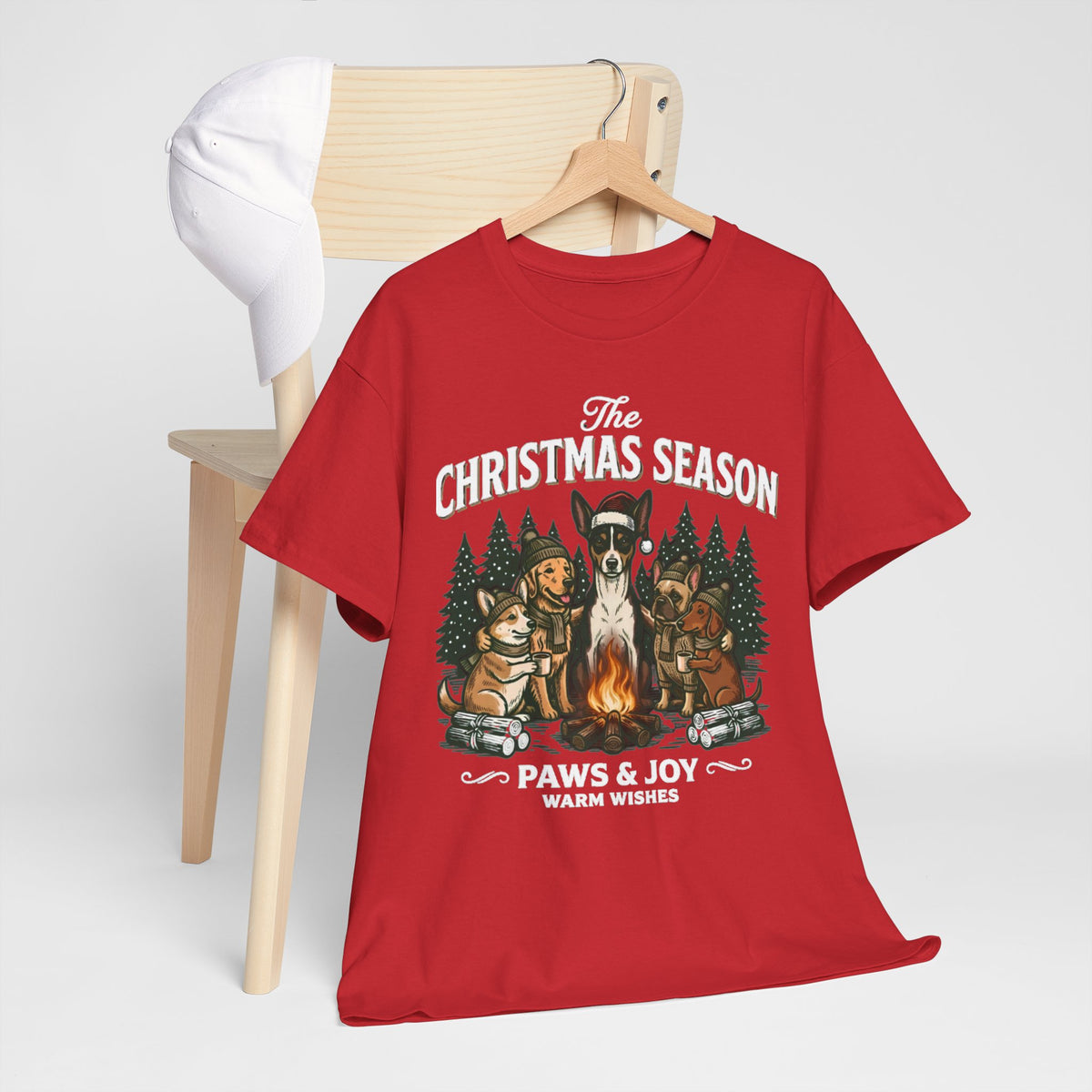 The Christmas Season Unisex T-Shirt — dogs gather around a warm campfire