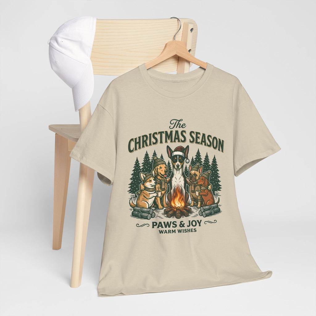 The Christmas Season Unisex T-Shirt — dogs settle in around a crackling campfire
