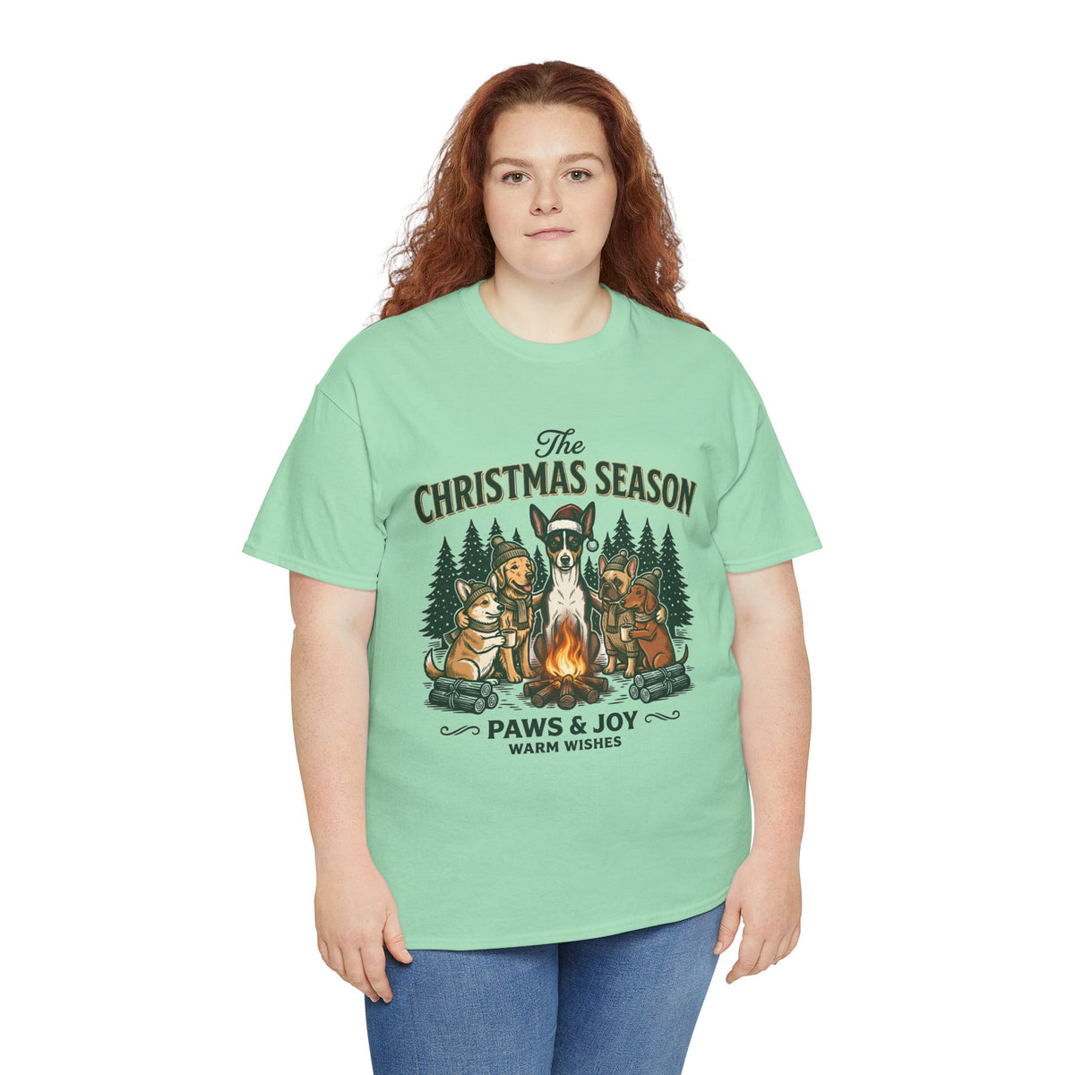 The Christmas Season Unisex T-Shirt — dogs settle in around a crackling campfire
