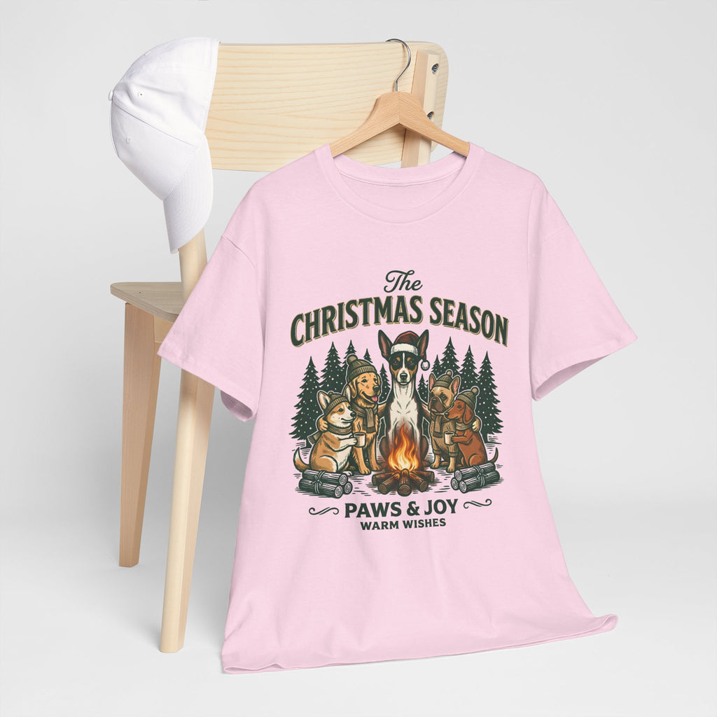 The Christmas Season Unisex T-Shirt — dogs settle in around a crackling campfire