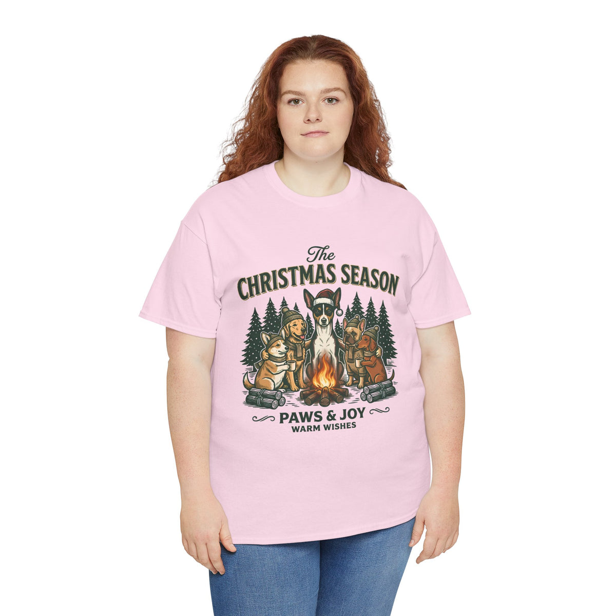 The Christmas Season Unisex T-Shirt — dogs settle in around a crackling campfire