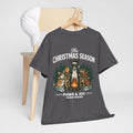 The Christmas Season Unisex T-Shirt — dogs gather around a warm campfire