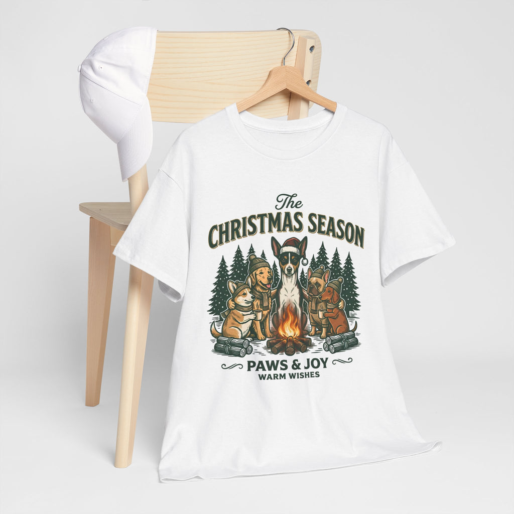 The Christmas Season Unisex T-Shirt — dogs settle in around a crackling campfire