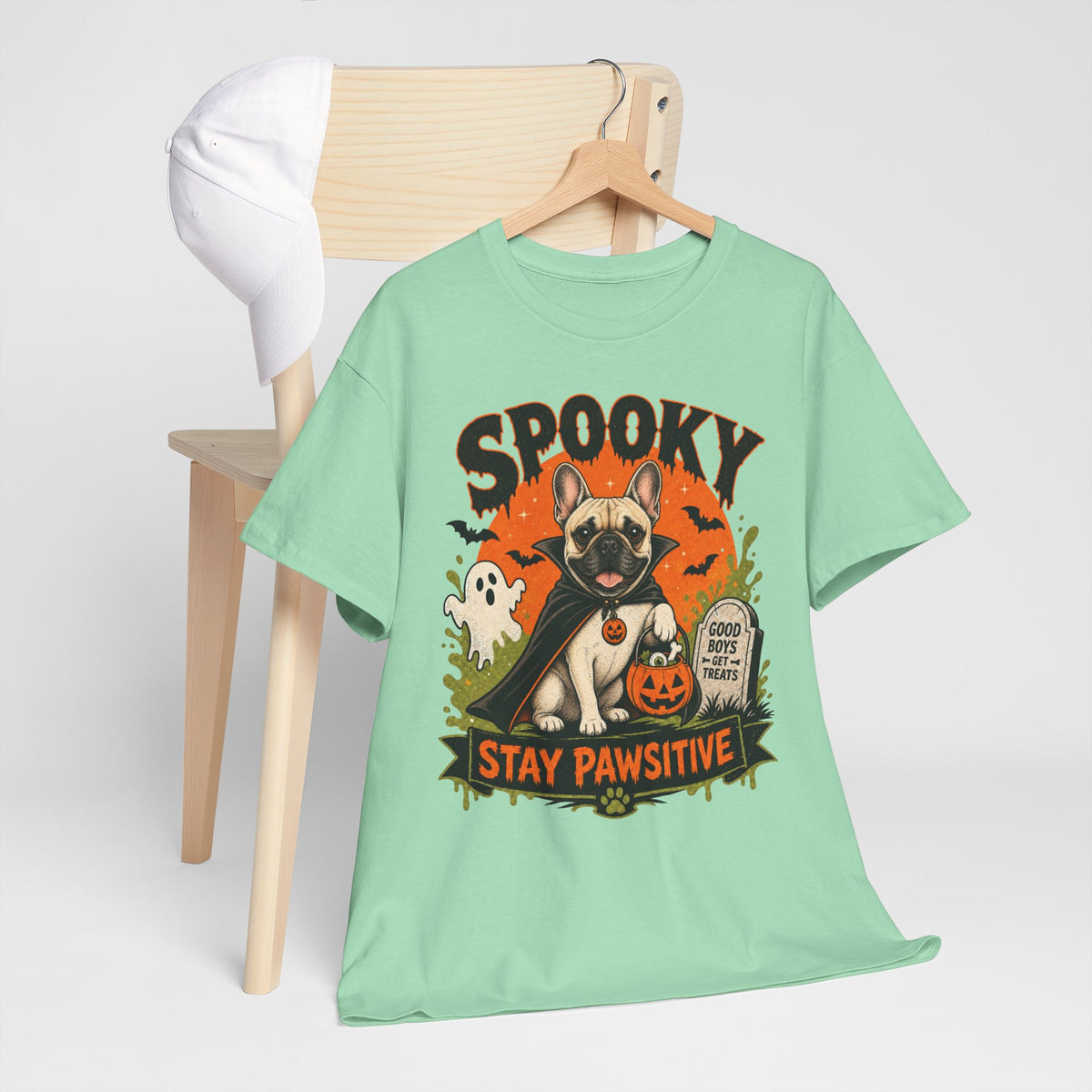 Spooky Stay Pawsitive Unisex T-Shirt — a vampire-caped French bulldog